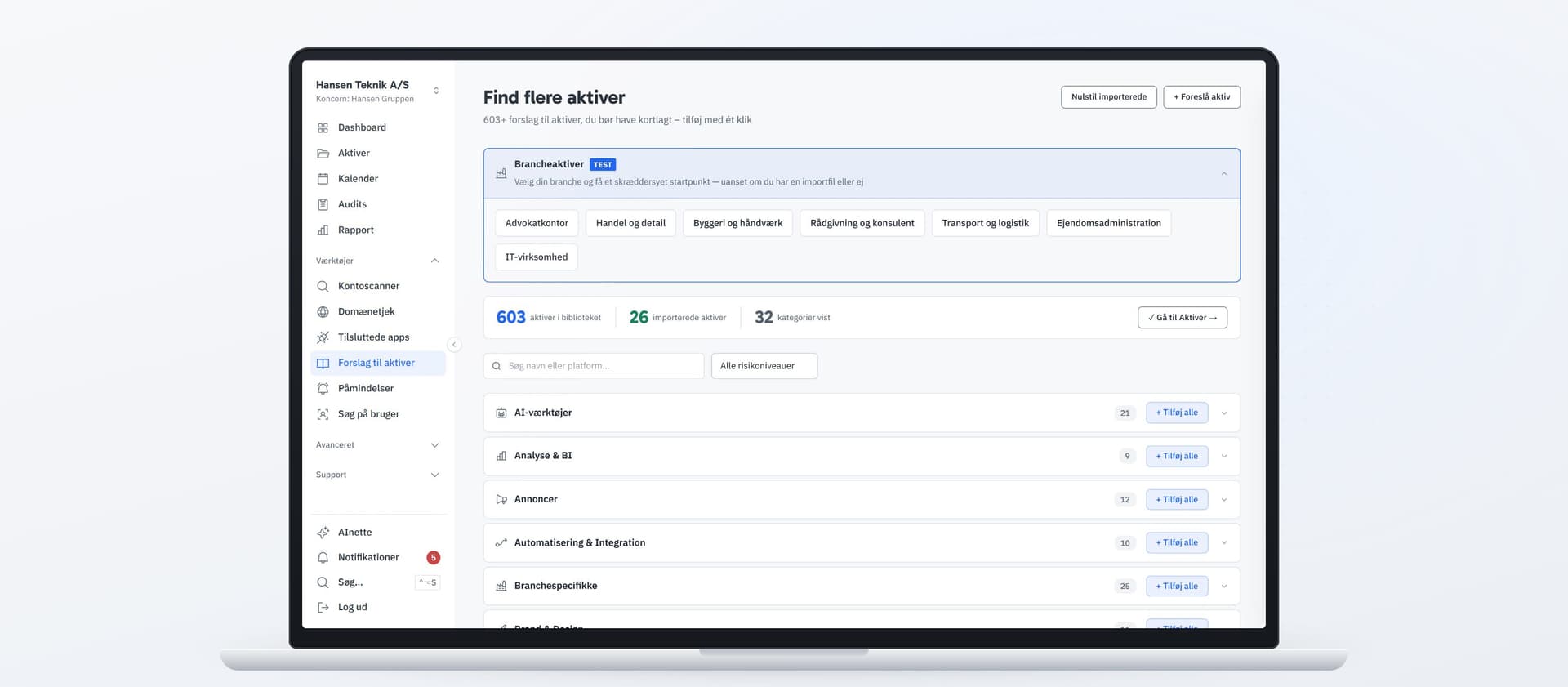 Ejerblik asset library shown on a laptop